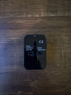 Source Unknown Black Universal Travel Adaptor with Surge Protector